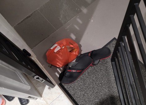 'Where did you learn your manners from?' Man upset after food delivery rider leaves order beside slippers on ground